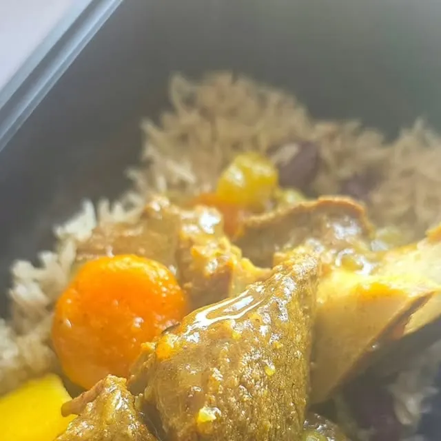 Jade’s curry goat with rice and peas